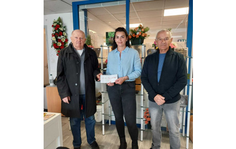 Remise de chèque par notre partenaire la société GARRETA